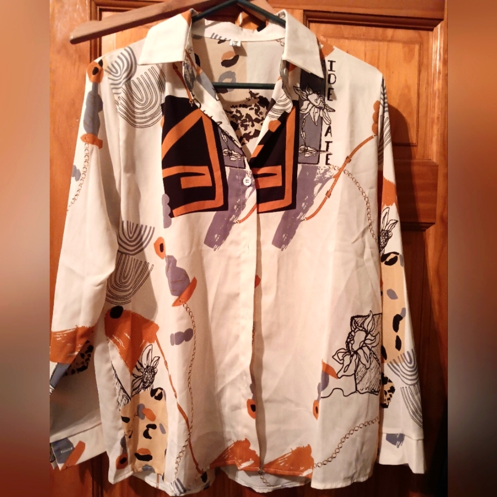 Trend studio etro Milano 100% silk loose lapel blouse